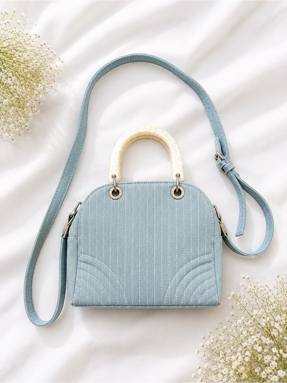 BCBG Light Blue Quilted Crossbody Bag with Ivory Handle